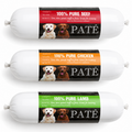 Three white packaged dog treats, tied at the top and bottom, shown side by side on a white background. The labels read PATE and show different flavor options: Pure Beef (red), Pure Chicken (orange), and Pure Lamb (green).